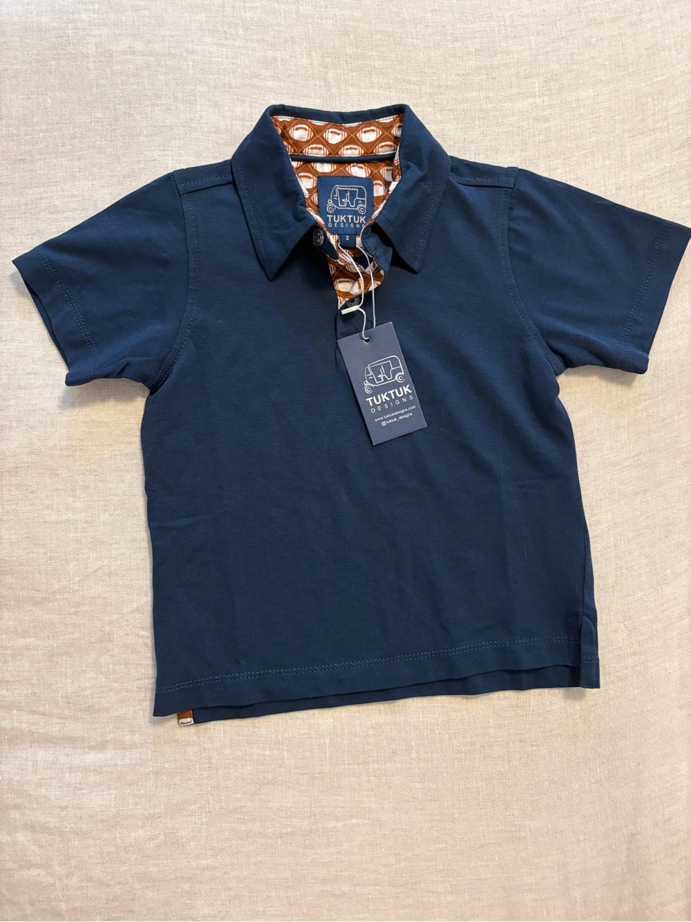 TukTuk Designs NWT Navy Blue Football Trim Polo Shirt Size 2